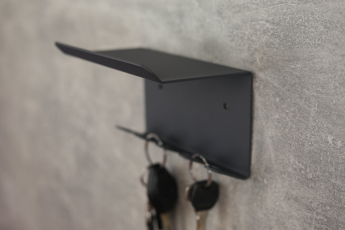 Bent metal key holder with hooks