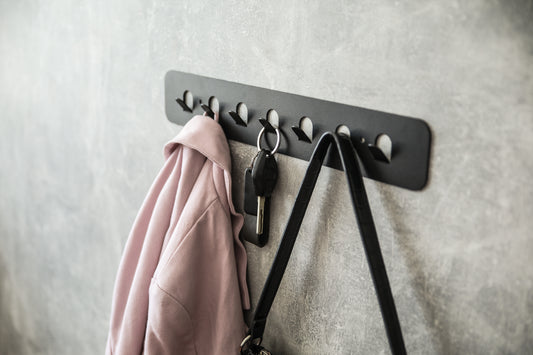 Bent metal hanger with hooks