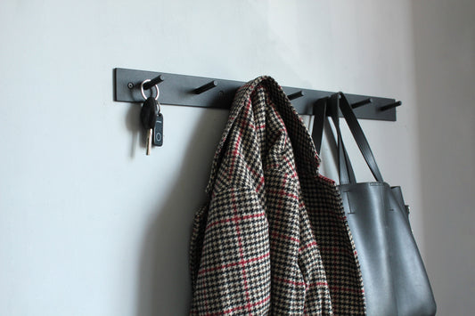 Metal clothes hanger with hooks