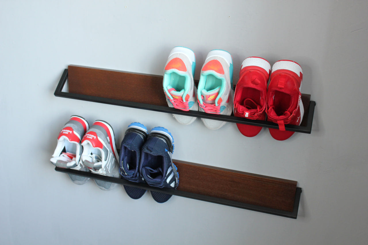 black industrial metal and wooden shoe rack